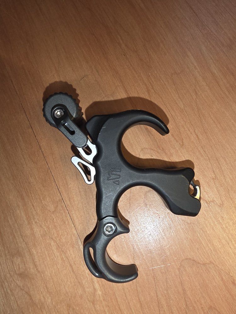 UV Button Thumb Release