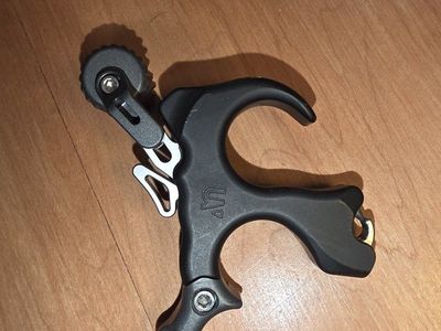 UV Button Thumb Release