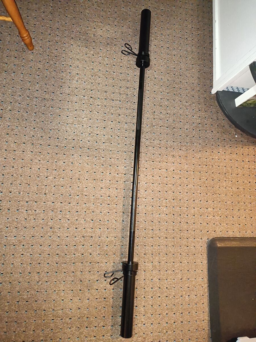 New 5 foot weight bar. 2 inch hole weights. With collars.