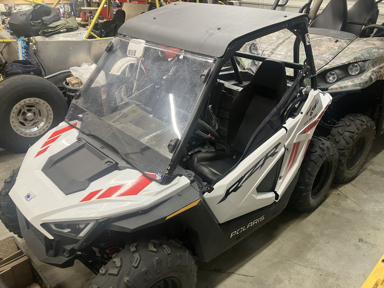 Polaris RZR Side-by-Side UTV with Windshield and Roof