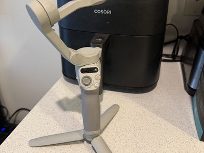 DJI Osmo Mobile SE 3-Axis Phone Gimbal + Tripod