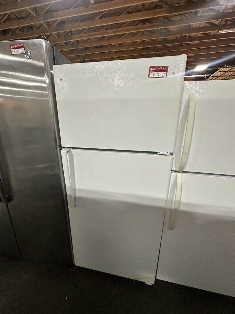 BIG SAVINGS! GOOD GE TOP AND BOTTOM FRIDGE
