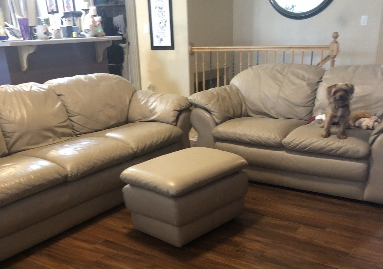 Leather couch, love seat and footstool