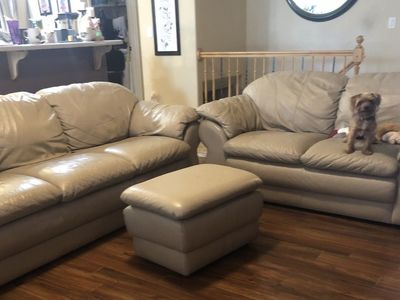Leather couch, love seat and footstool