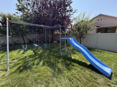 Outdoor Metal Swing Set with Slide and Monkey Bars