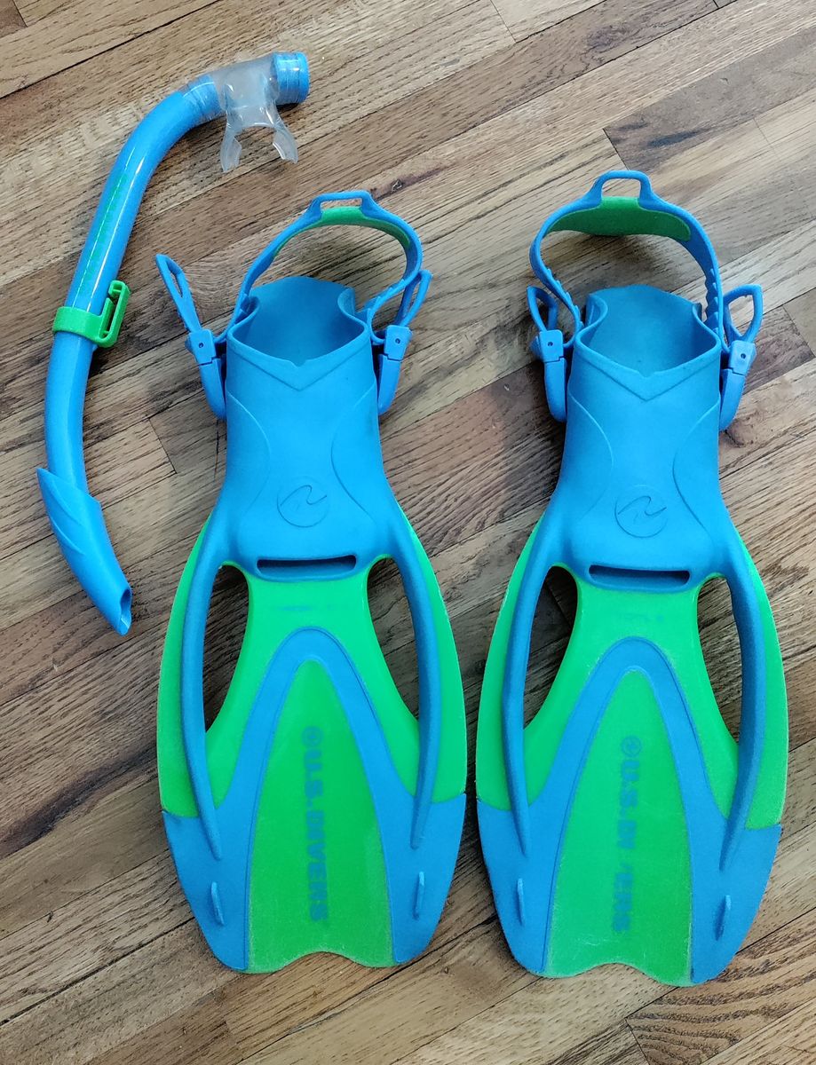 U.S. Divers Proflex Jr. adjustable, open-heel snorkeling fins in green and blue with snorkel