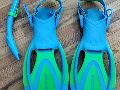 U.S. Divers Proflex Jr. adjustable, open-heel snorkeling fins in green and blue with snorkel