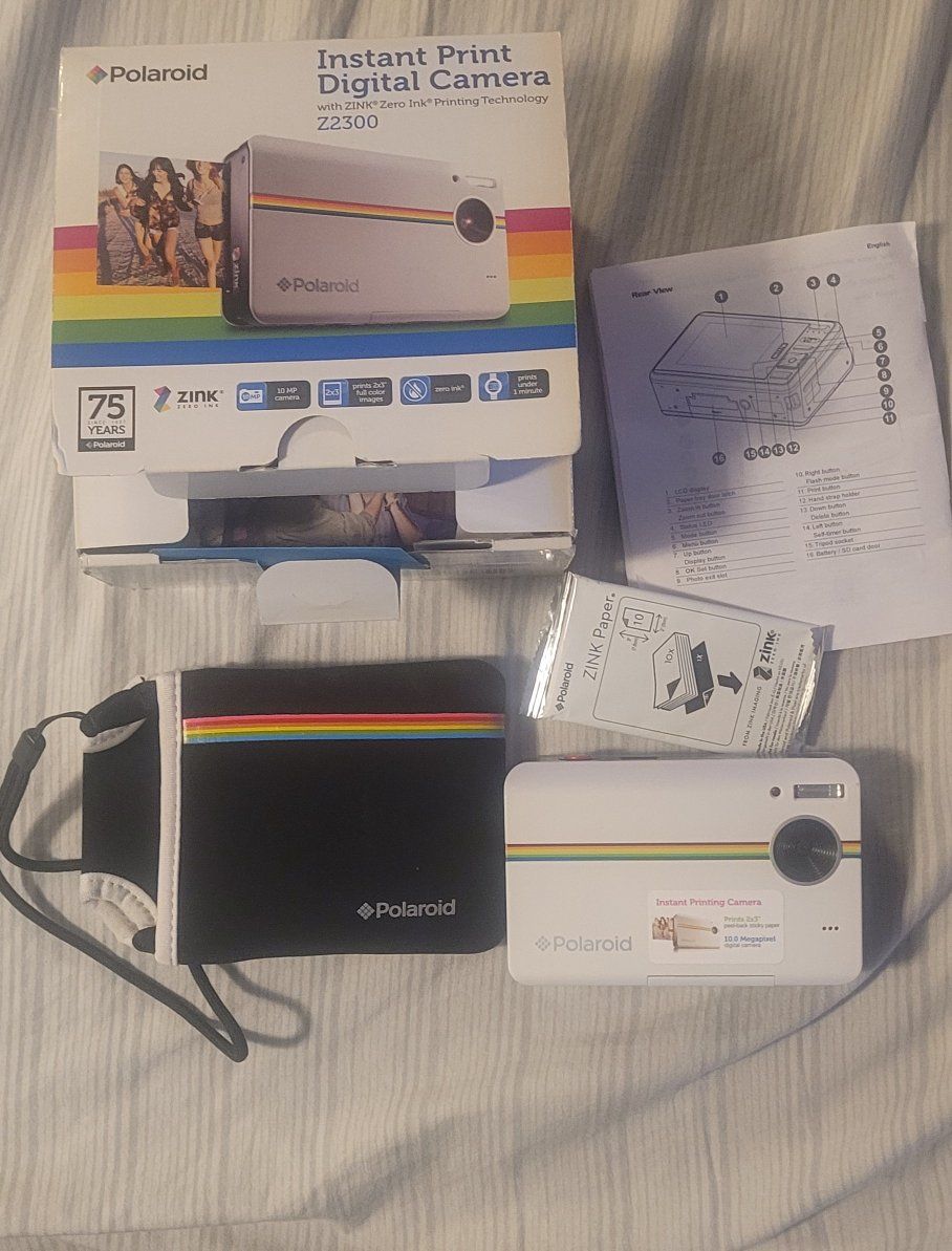 Polaroid PoGo Instant Mobile Photo Printer with ZINK Zero Ink Technology, Portable, White. works great.
