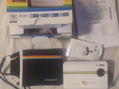Polaroid PoGo Instant Mobile Photo Printer with ZINK Zero Ink Technology, Portable, White. works great.