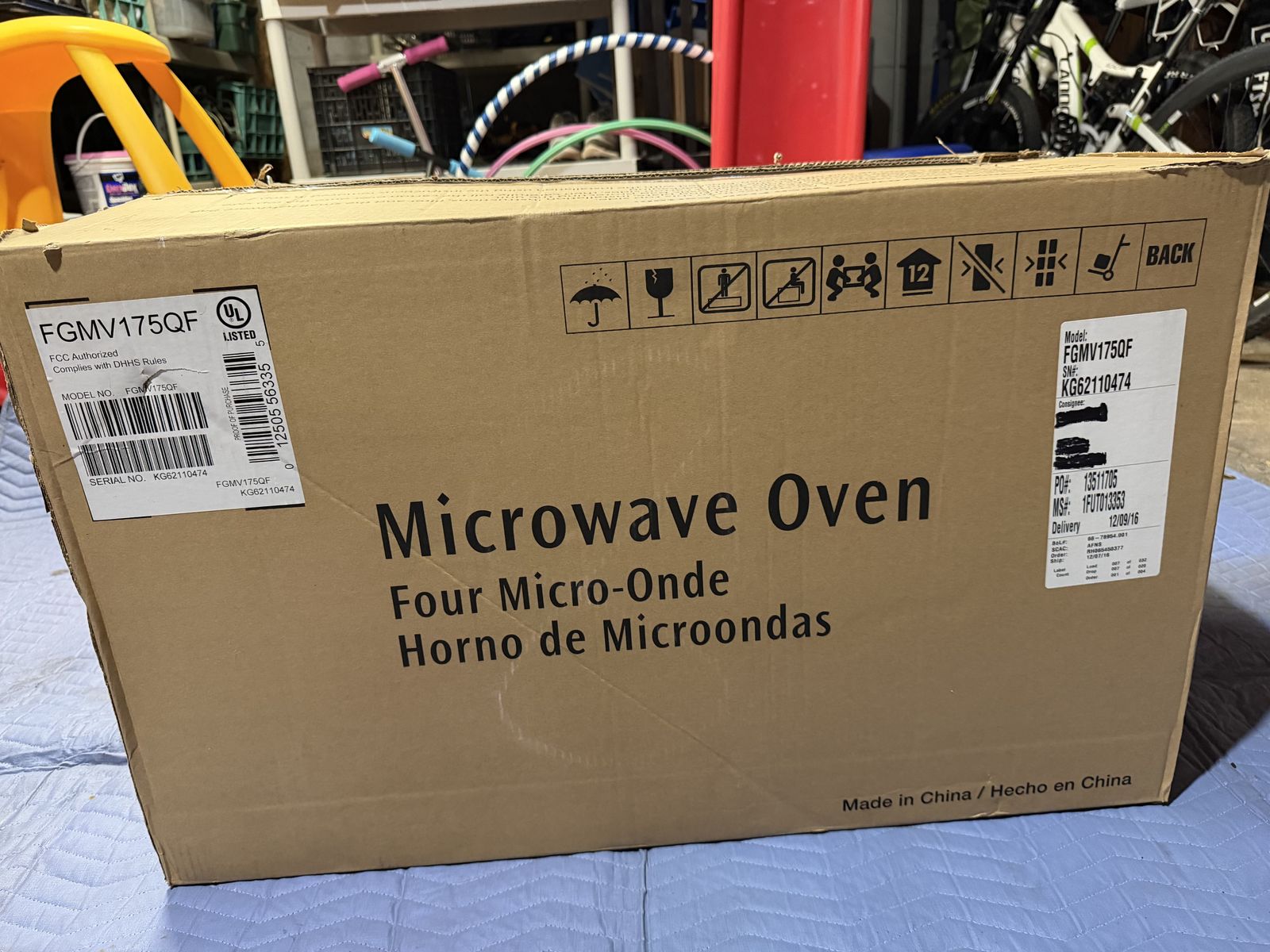 Brand new, never opened Frigidaire Gallery Over-the Range Microwave and Dishwasher!
