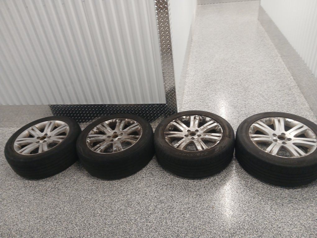 4 18" aluminum rims with tires