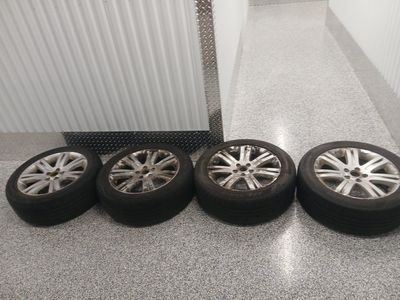 4 18" aluminum rims with tires