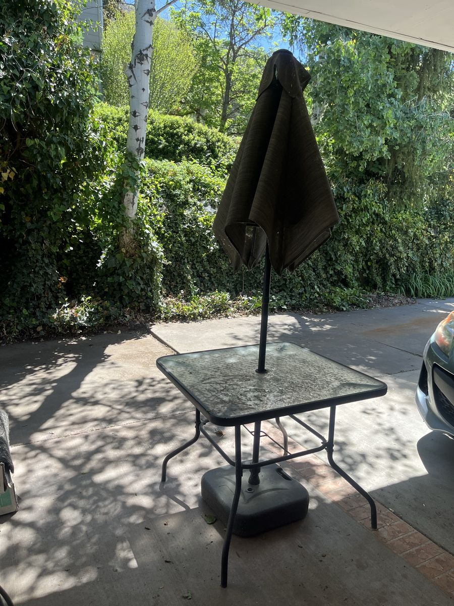 Small patio table + umbrella + 4 folding chairs