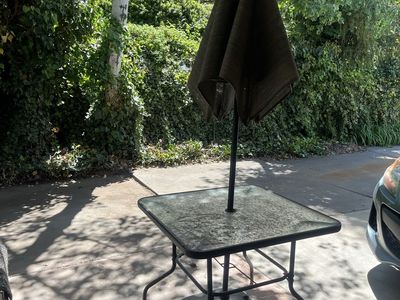 Small patio table + umbrella + 4 folding chairs