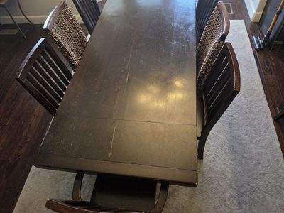 Dark Wood Dining Table Set with Trestle Base and Matching Chairs