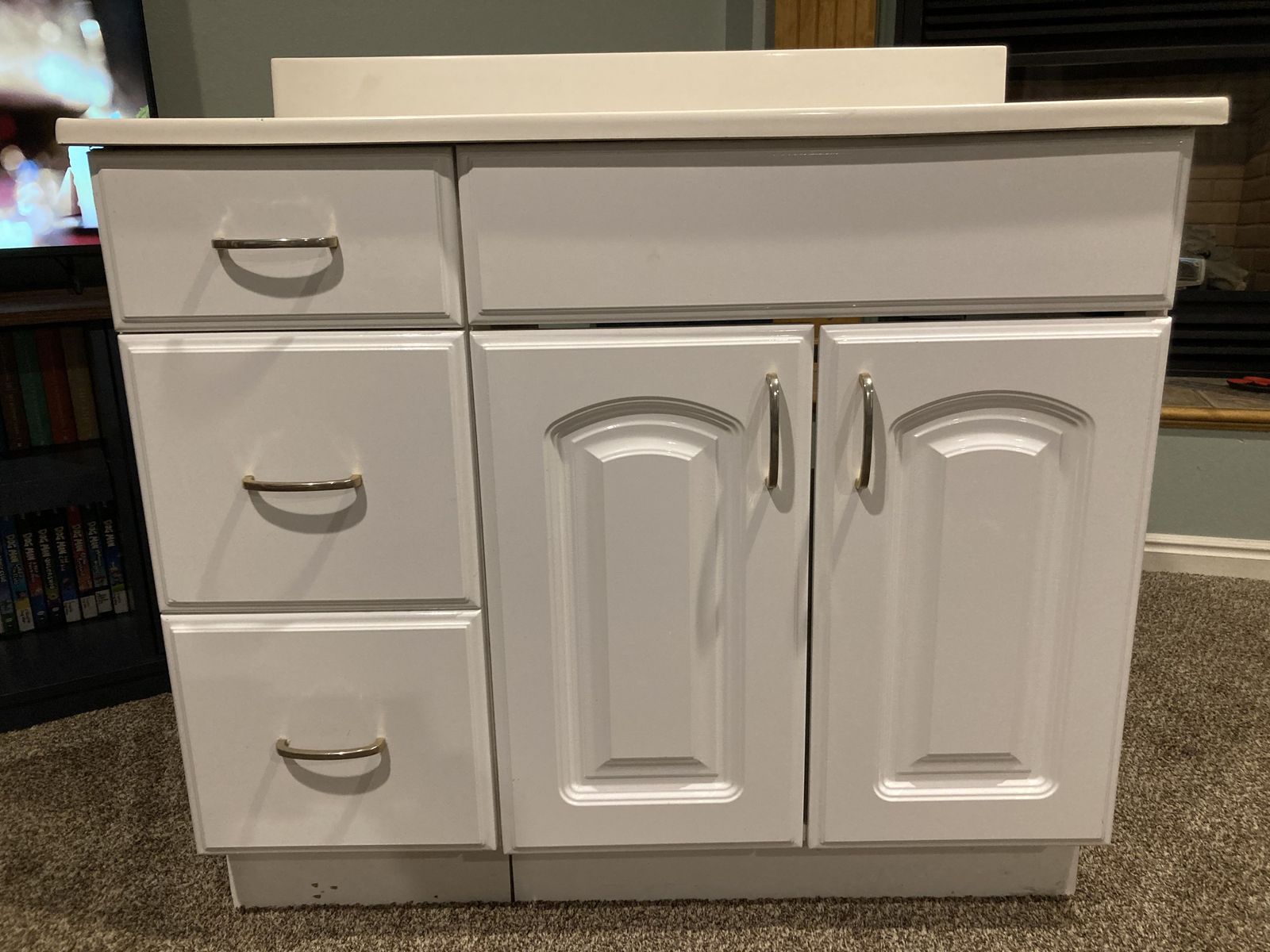 36" bathroom vanity, sink on right.