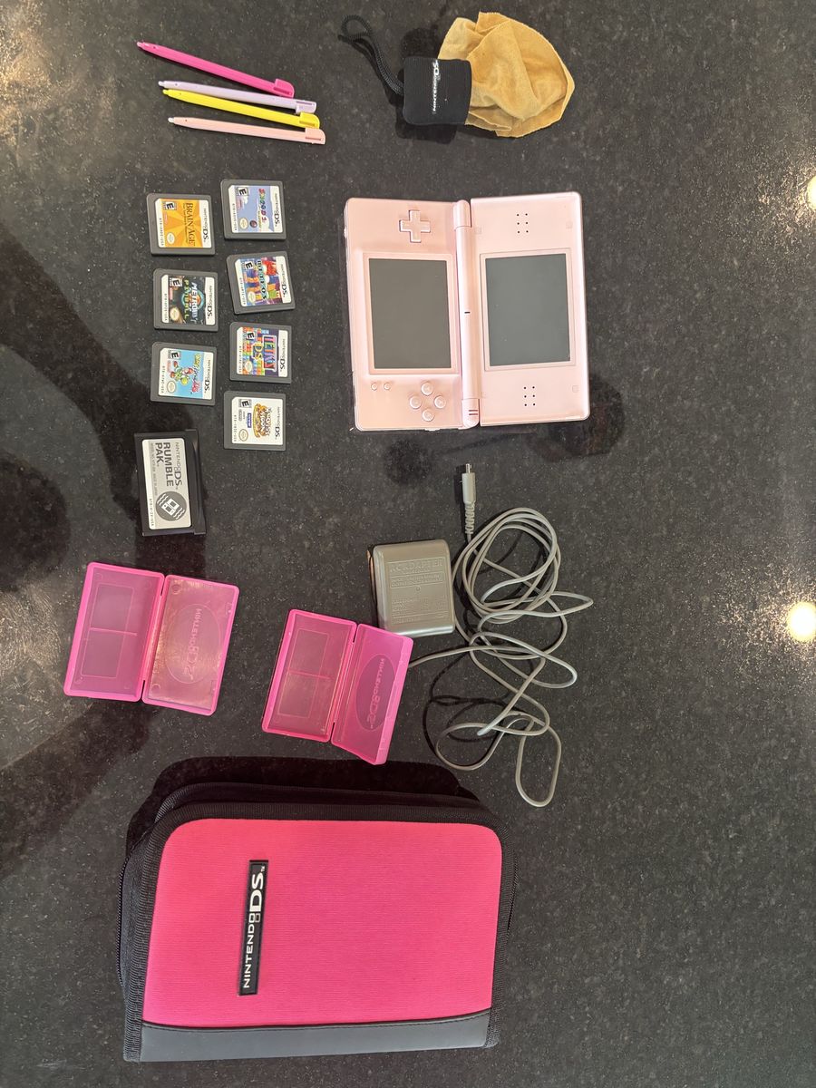 Nintendo DS Lite Pink Handheld Console Bundle with Games, Charger, Case, and Accessories