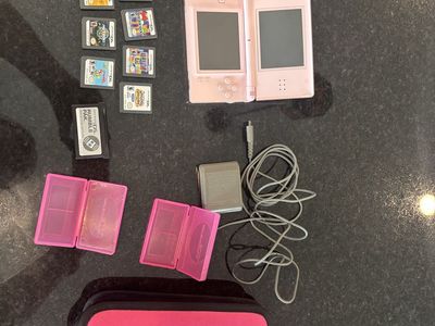 Nintendo DS Lite Pink Handheld Console Bundle with Games, Charger, Case, and Accessories