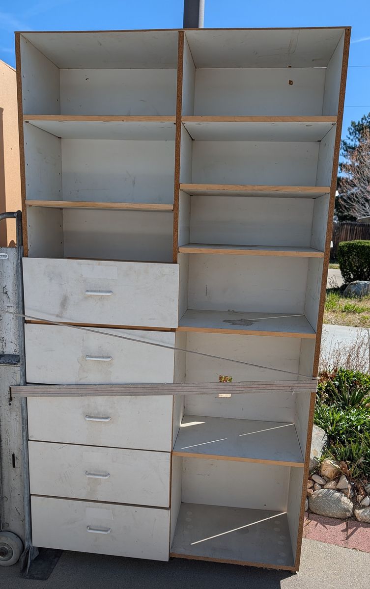 "built in" shelf units with drawers