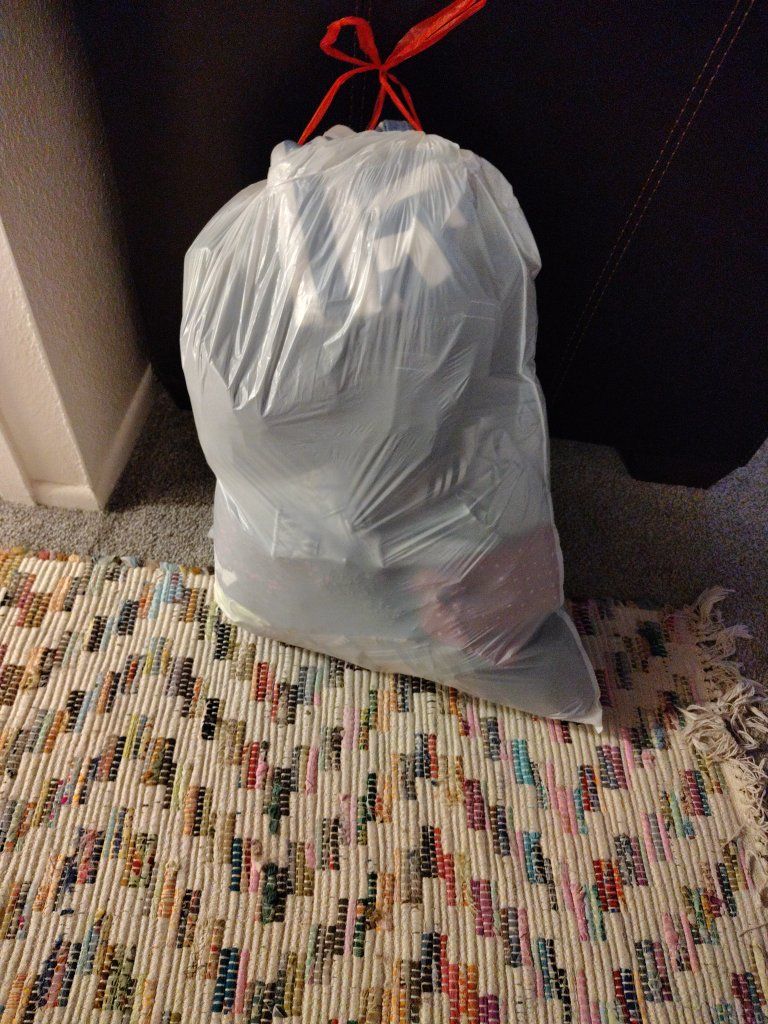 a bag of all sorts of good of clothes. small medium to large.