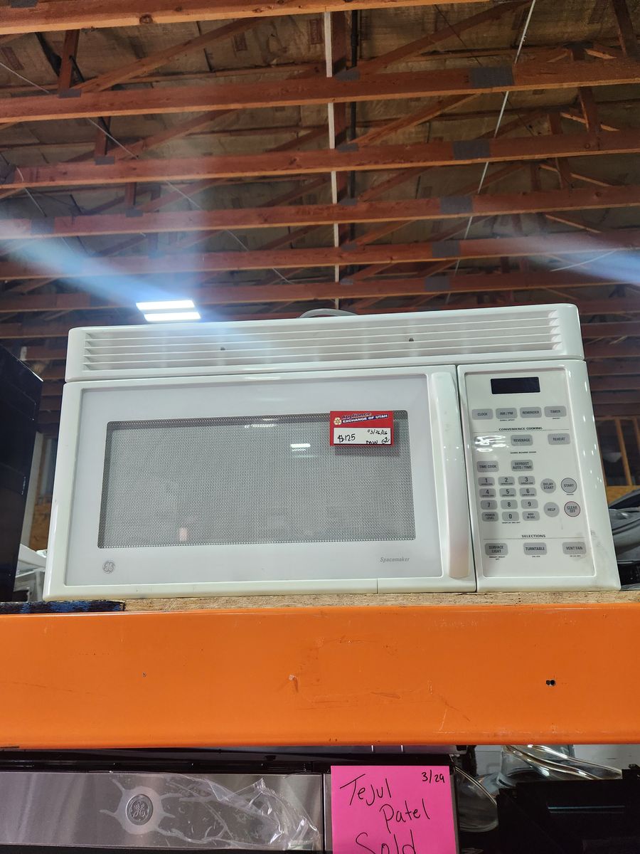 LOW PRICE GUARANTEED! GE WHITE OVER THE RANGE MICROWAVE!