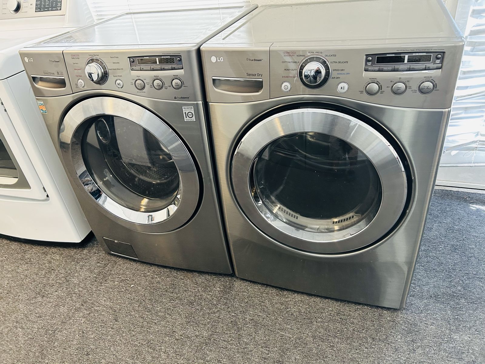 Lg stainless washer and dryer set with steam option. 