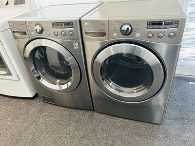 Lg stainless washer and dryer set with steam option.