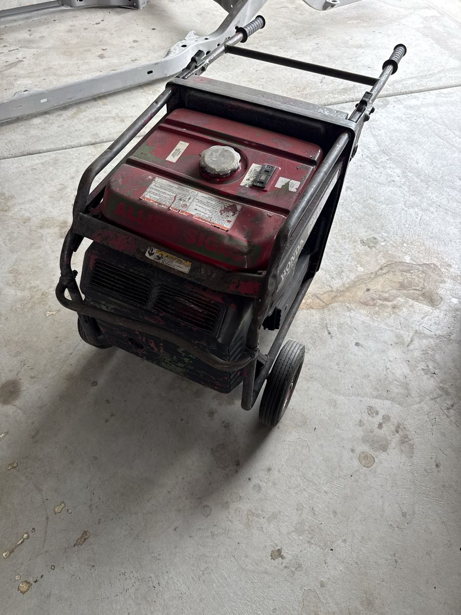 Honda EM7000iS Inverter Generator - Used, Needs Work (Red)