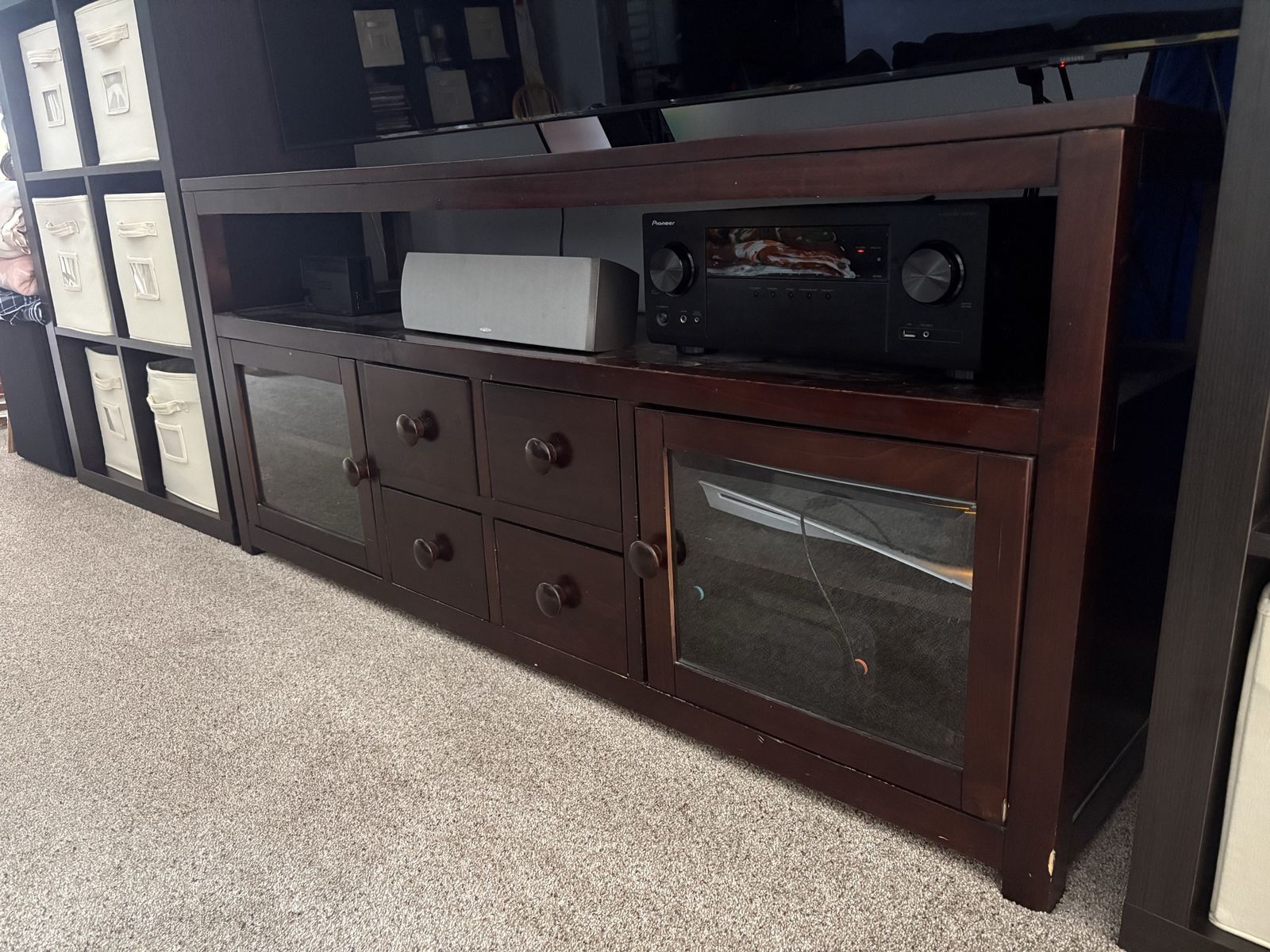Dark Wood Media Entertainment Center with Glass Doors and Storage Drawers