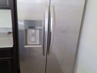 Frigidaire Stainless Steel Side-by-Side Refrigerator with Ice Maker & Water Dispenser