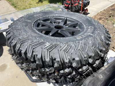 Brand new Coyote 32x10.00x15 wheel and tire