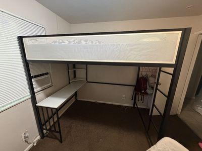 Loft bed with shelves and desk