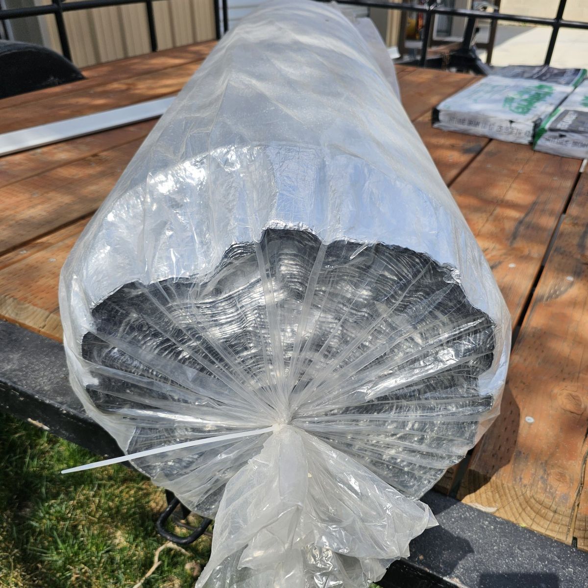 Silver reflective underlayment roll. Roofing