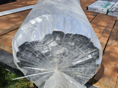 Silver reflective underlayment roll. Roofing