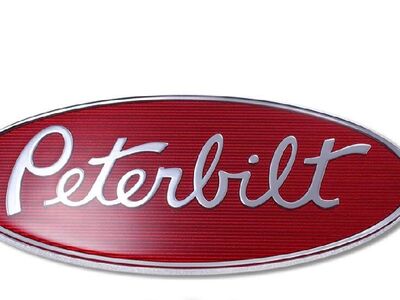 PETERBILT NAMEPLATE-PB LOGO 12" 20-19279 BROKEN TAB