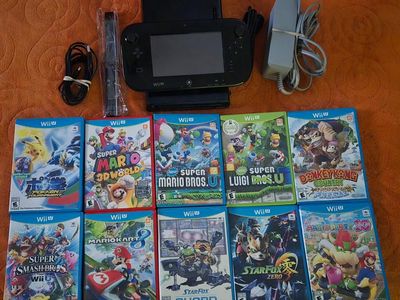 Wii U Deluxe with 10 games!~ trades considered~