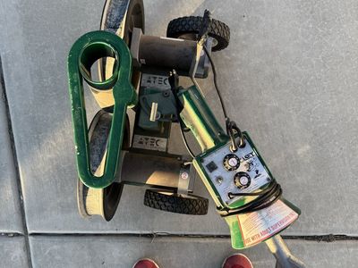 ATEC baseball pitching and fielding machine. Can throw all varieties of pitches also run defense practice with ground/fly balls