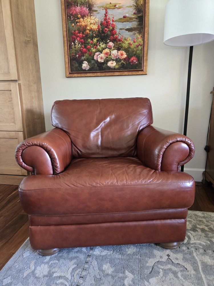 Brown Leather Armchair - Deep Seating & Rolled arms.