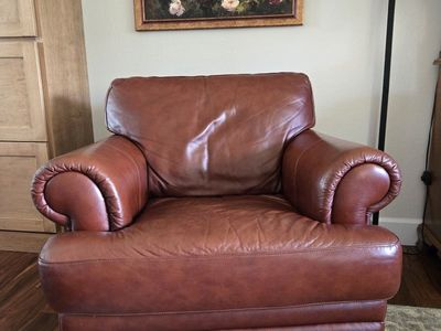 Brown Leather Armchair - Deep Seating & Rolled arms.
