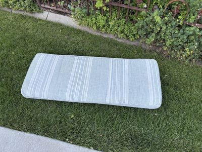 Long striped bench cushion 46 X 18 does have some marks on back.