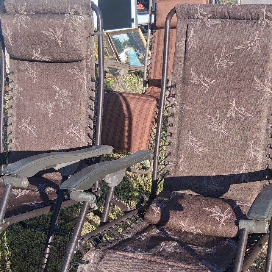 Reclining outdoor chairs.