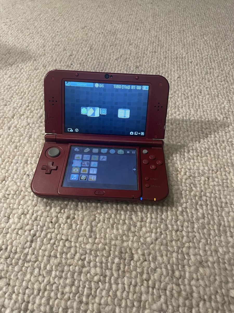 Nintendo New 3DS XL Red great condition + charger + 12 3ds games + game case
