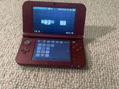 Nintendo New 3DS XL Red great condition + charger + 12 3ds games + game case