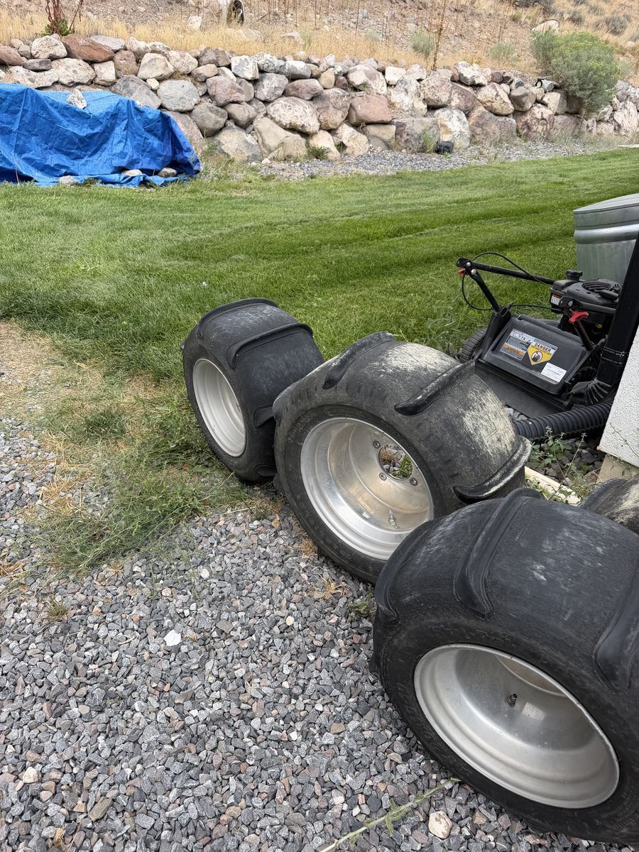 2008 Yamaha raptor  paddle tires and rims $50 or OBO 