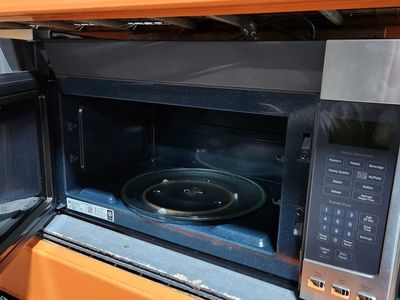GREAT GE STAINLESS STEEL OVER THE RANGE MICROWAVE!
