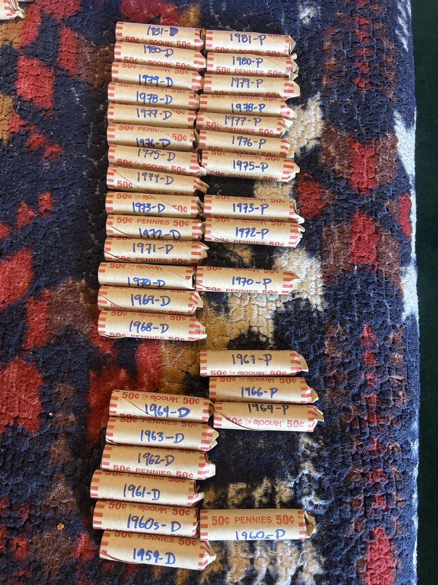 Collection of Rolled US Lincoln Memorial Pennies Sorted by Year and Mint Mark (1959-1981)