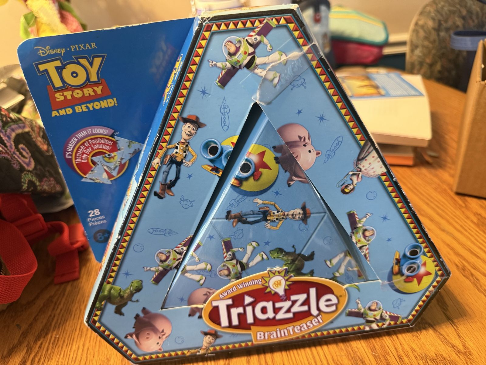 Disney Pixar Toy Story Triazzle Brain Teaser Puzzle, 28 Pieces, Award-Winning Logic Game, Age 8+