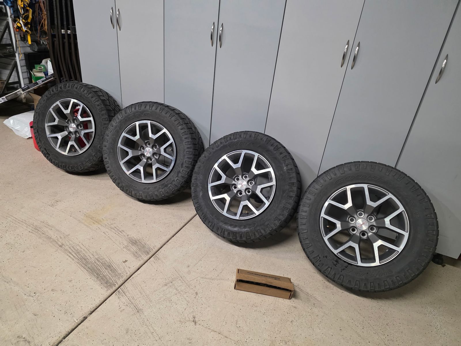 265/65R17 Goodyear Wrangler Duratrac with OEM GMC 17" alloy wheels