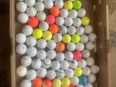 100 used golf balls