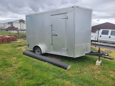 Enclosed Trailer, Siding Brake, and mounted Gutter Bending Machine.